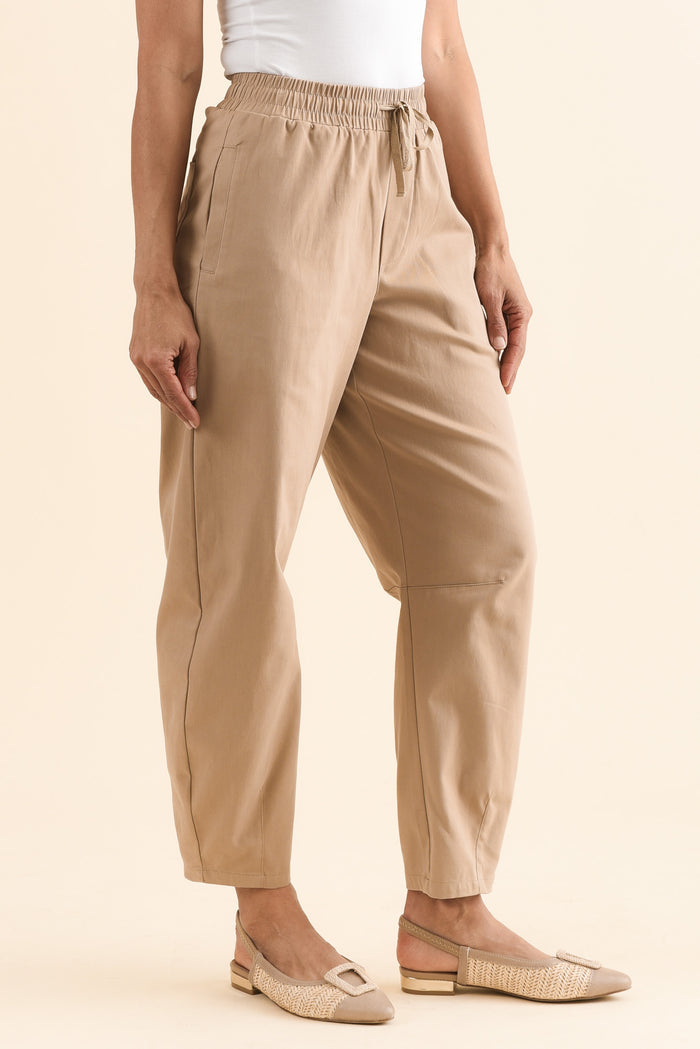 Andy Beige Cotton Barrel Pants,Side,Brunette model,alt text|model:Cara