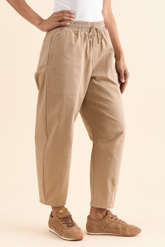 Andy Beige Cotton Cropped Barrel Pants,Side,Brunette model,alt text|model:Cara