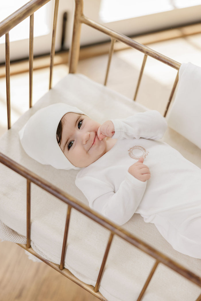 Baby Girl Footie & Bonnet – Ivory Girl – Metallic Crest