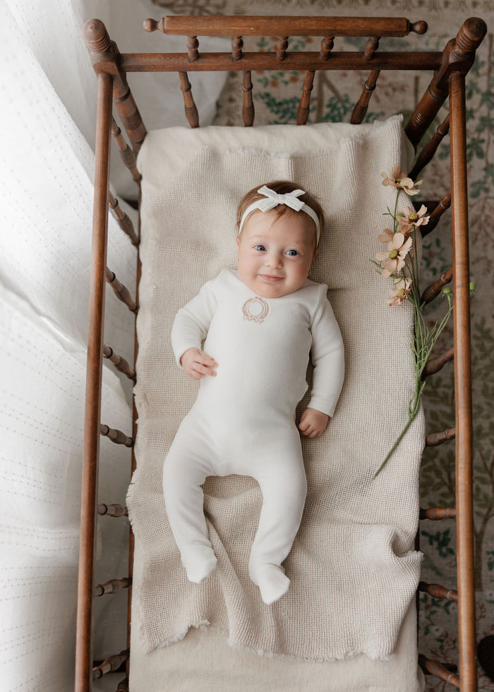 Baby Girl Footie – Ivory Girl – Metallic Crest