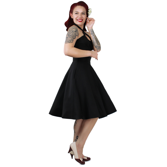 Model wearing dress, pictured from the side