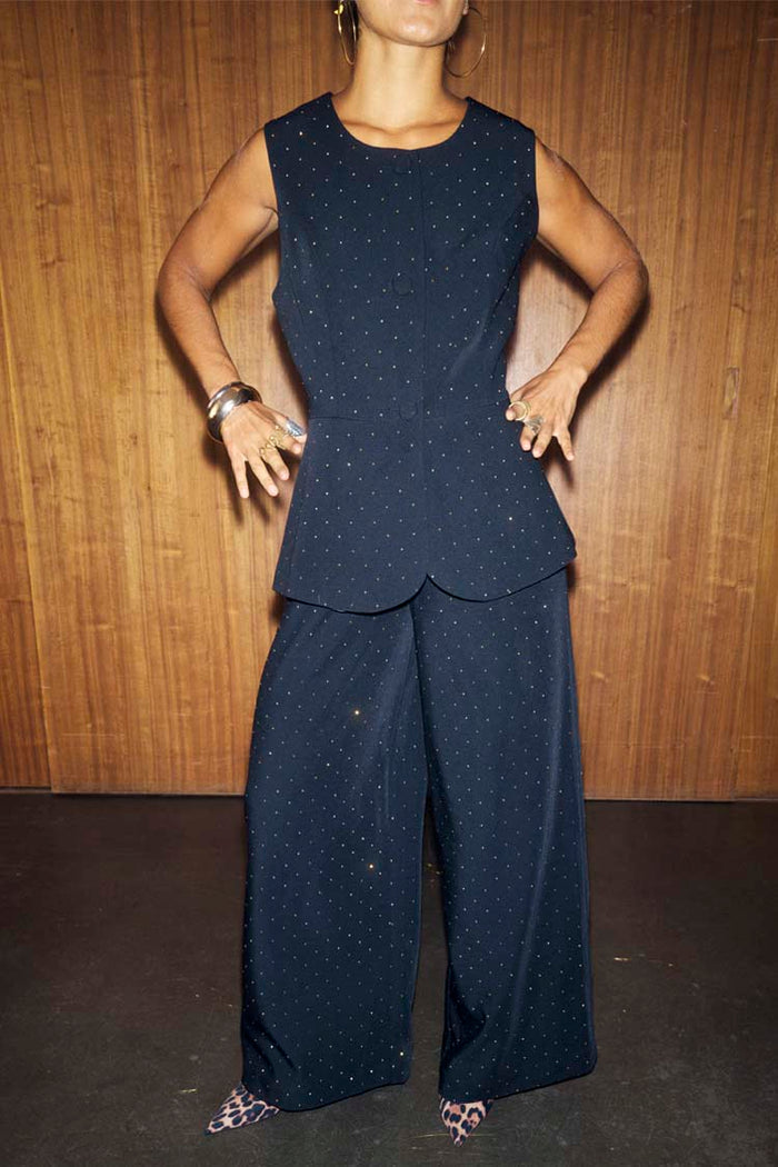 Black Hotfix Marnie Trousers with silver sparkle, styled as a co-ord with a matching waistcoat and leopard shoes.