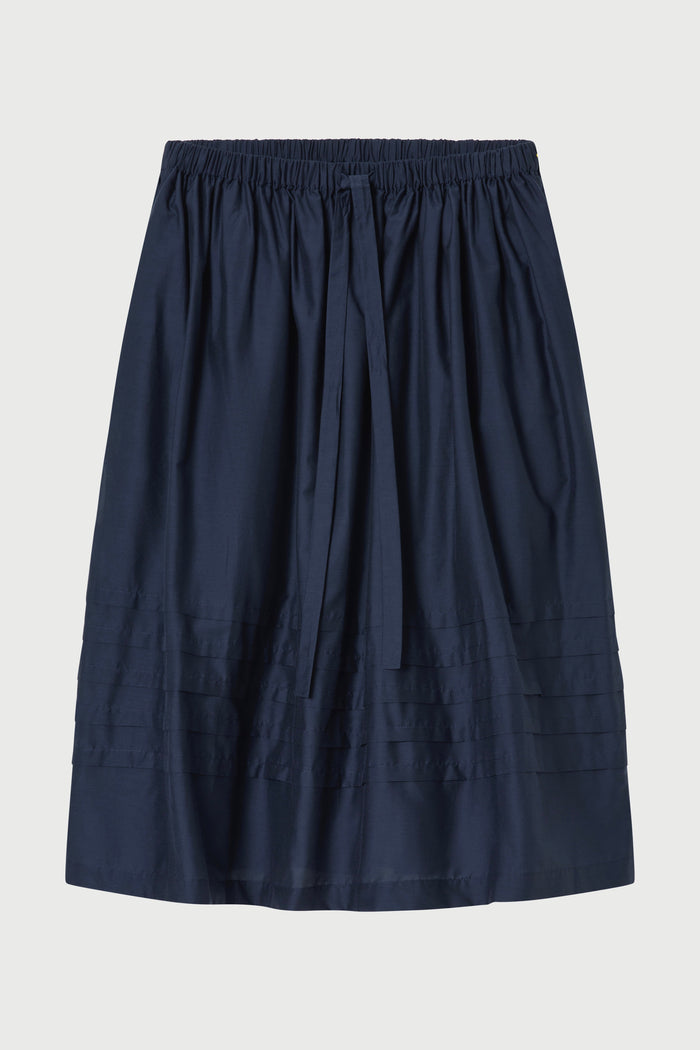 Navy blue skirt on a light gray background