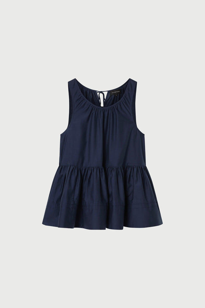Navy blue blouse with a gathered detail  a white background
