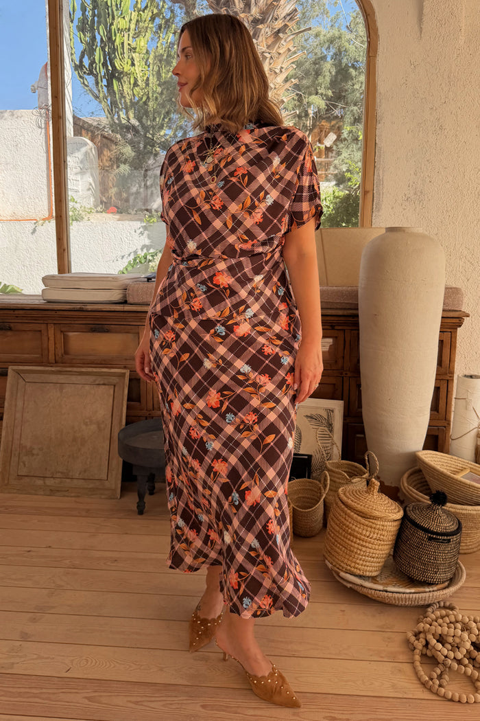 Chocolate brown Check Floral Lottie Skirt and matching top with vibrant floral motifs in a lifestyle setting.