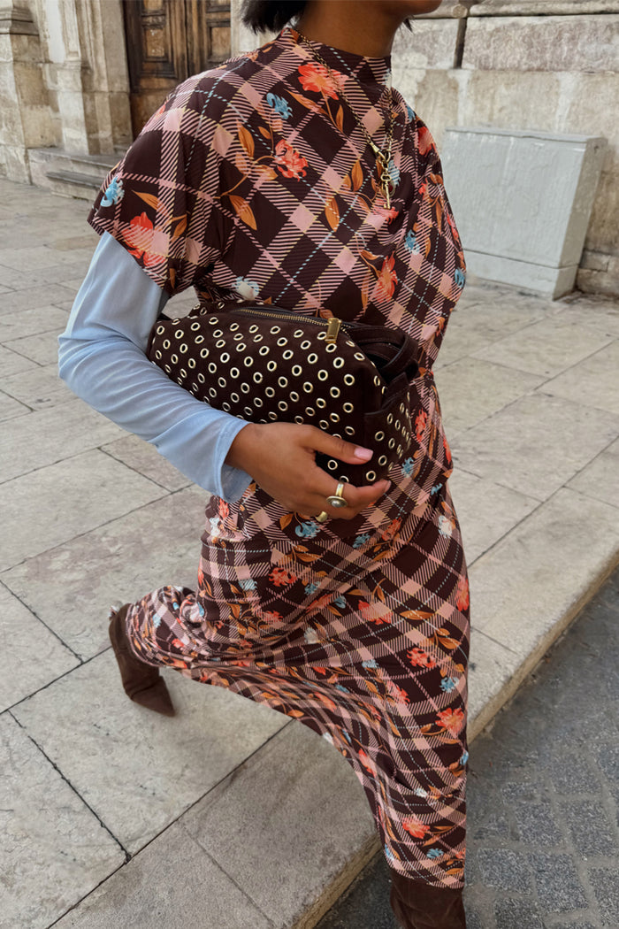 Check Floral Lottie midi skirt in chocolate brown with floral motifs, styled as a layered co-ord outdoors.