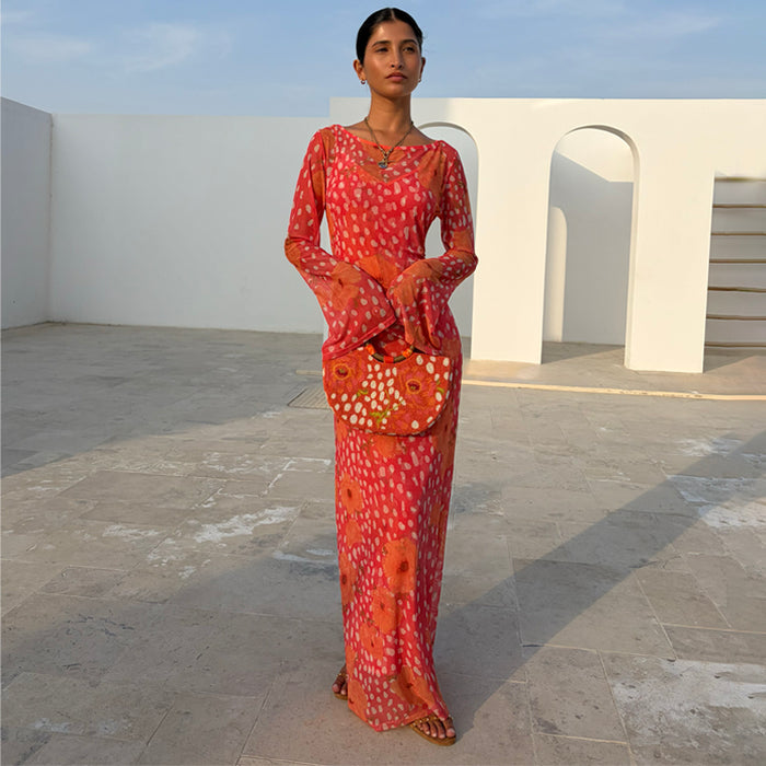 Coral Fawn Poppy Aria Dress in coral pink sheer mesh with poppy motifs, deer print and flared sleeves.