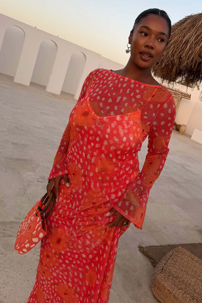 Coral Fawn Poppy Aria Dress in sheer coral pink mesh with poppy motifs and fawn print featuring flared sleeves.