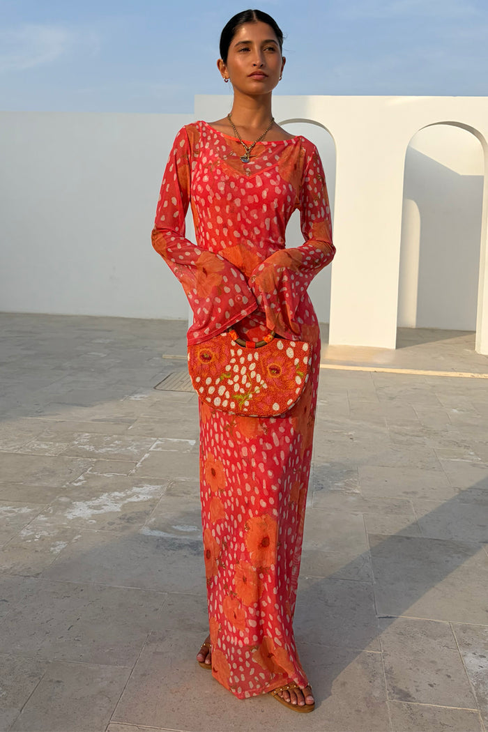 Coral Fawn Poppy Aria midaxi dress with poppy and deer prints, flared sleeves and a sheer finish.