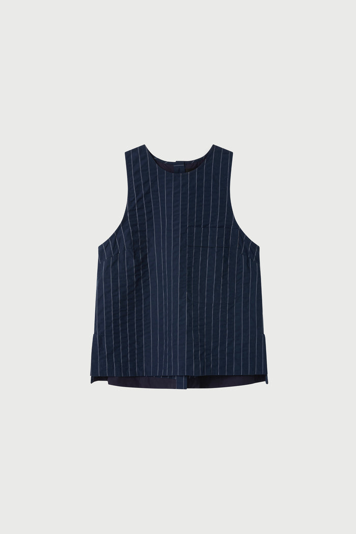 Blue pinstripe sleeveless top on a light gray background