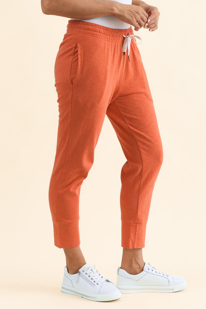 Fundamental Brunch Orange Cotton Sweatpants,Side,Brunette model,alt text|model:Cara