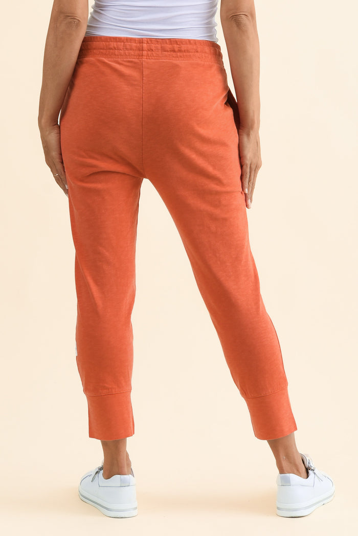 Fundamental Brunch Orange Cotton Sweatpants,Back,Brunette model,alt text|model:Cara
