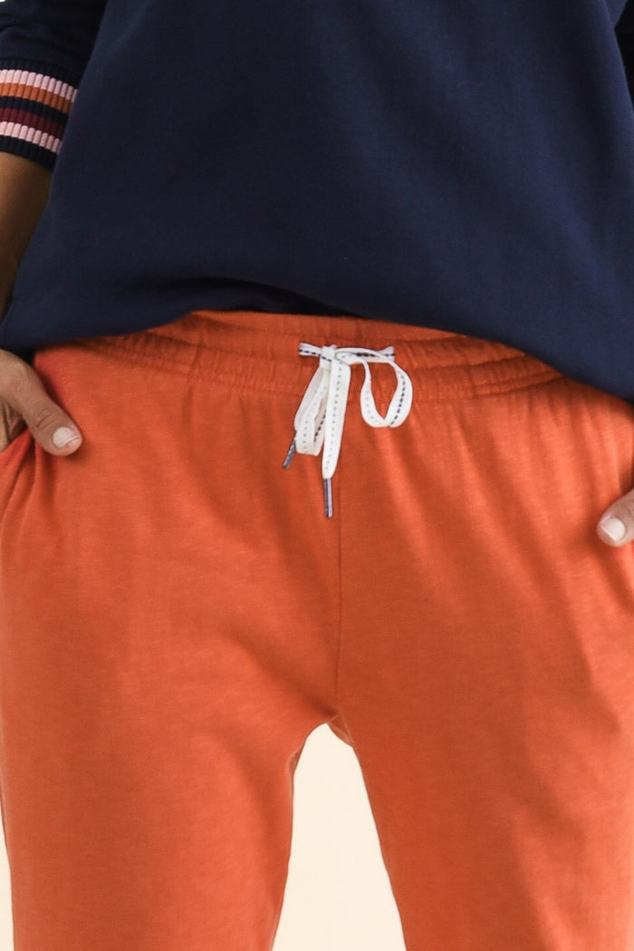 Fundamental Brunch Orange Cotton Sweatpants,Detail,Brunette model,alt text|model:Cara