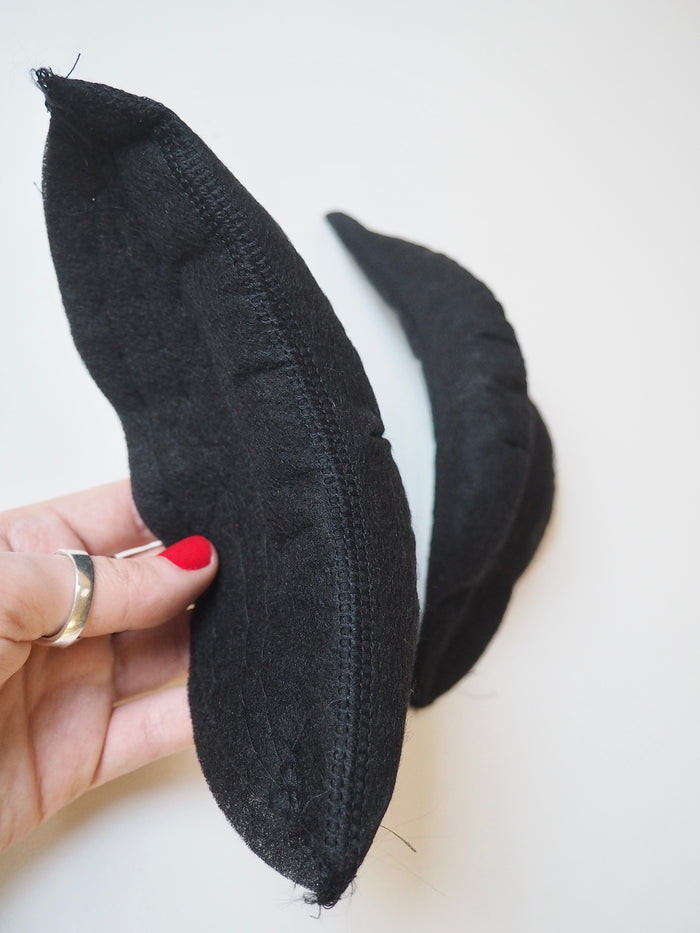 High Arched Black Shoulder Pads
