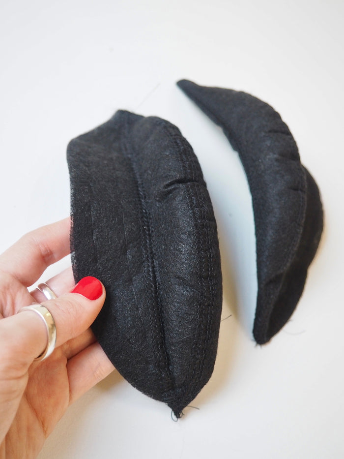 High Arched Black Shoulder Pads