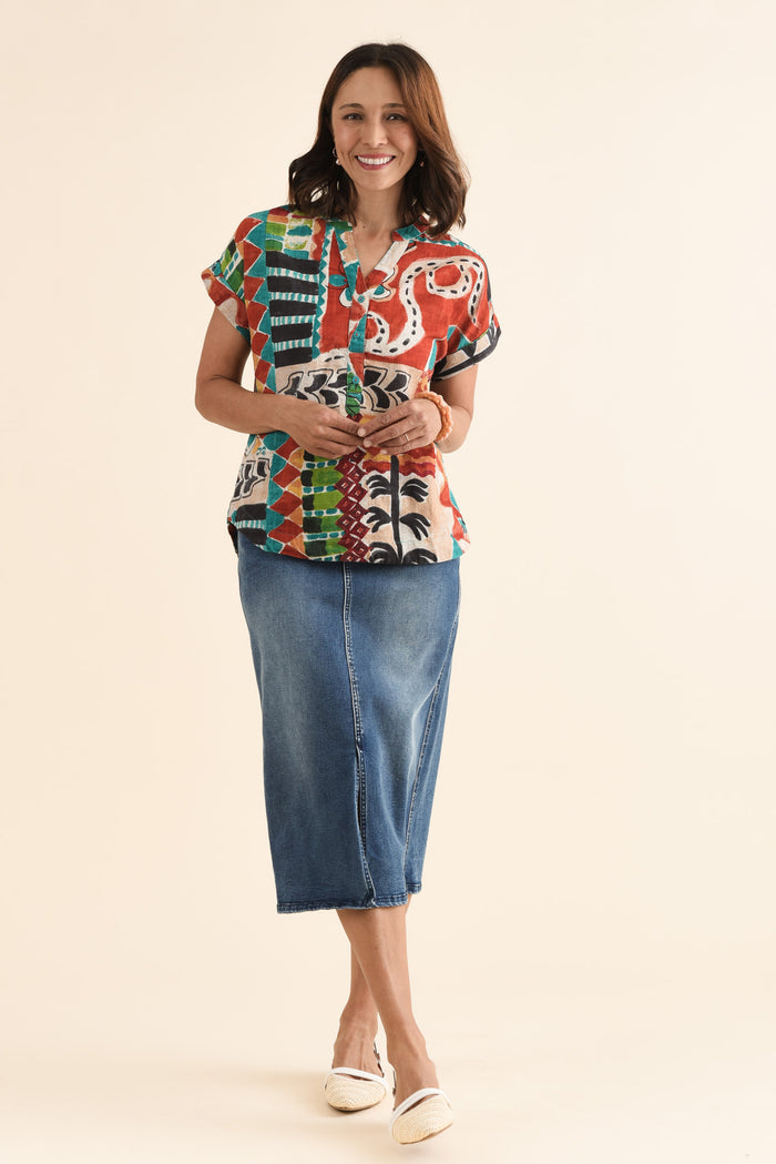 Melda Orange Tropical Organic Cotton Top,Full Body,Brunette model,alt text|model:Cara