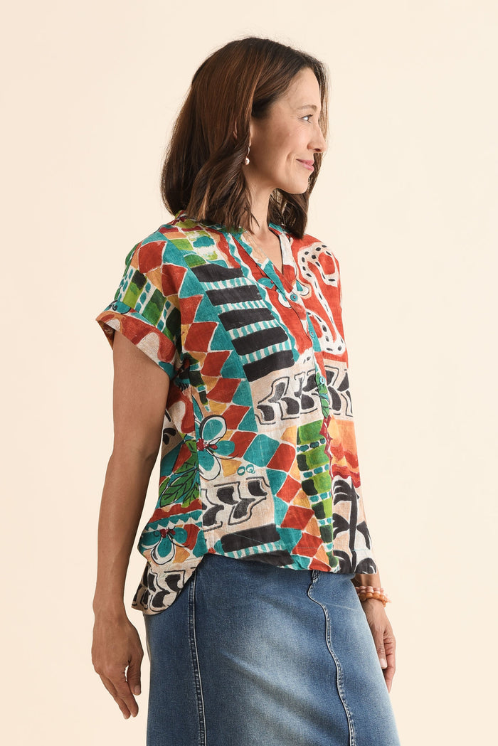 Melda Orange Tropical Organic Cotton Top,Side,Brunette model,alt text|model:Cara