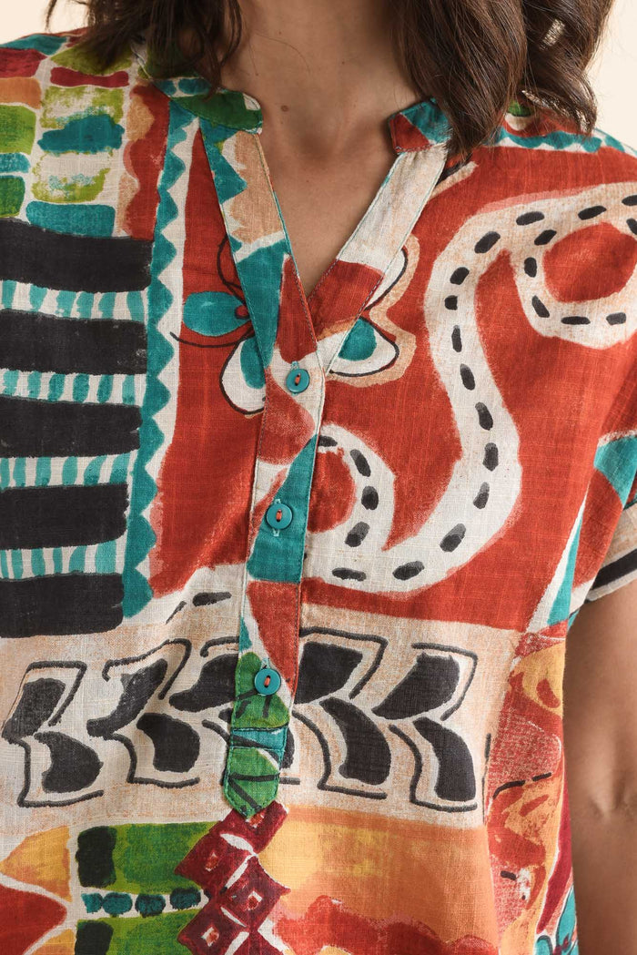 Melda Orange Tropical Organic Cotton Top,Detail,Brunette model,alt text|model:Cara