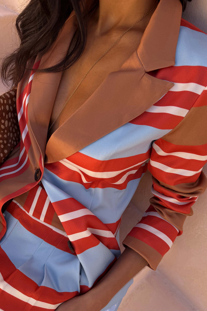 NFD Multi Stripe Blazer in red and blue with tan lapels and a structured silhouette in satin-esque fabric.