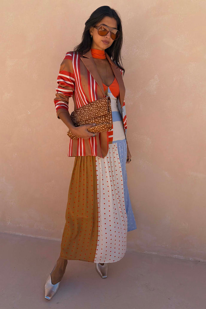 Multi Stripe Blazer with a bold red and blue longline silhouette and satin-esque finish, styled with clashing prints.