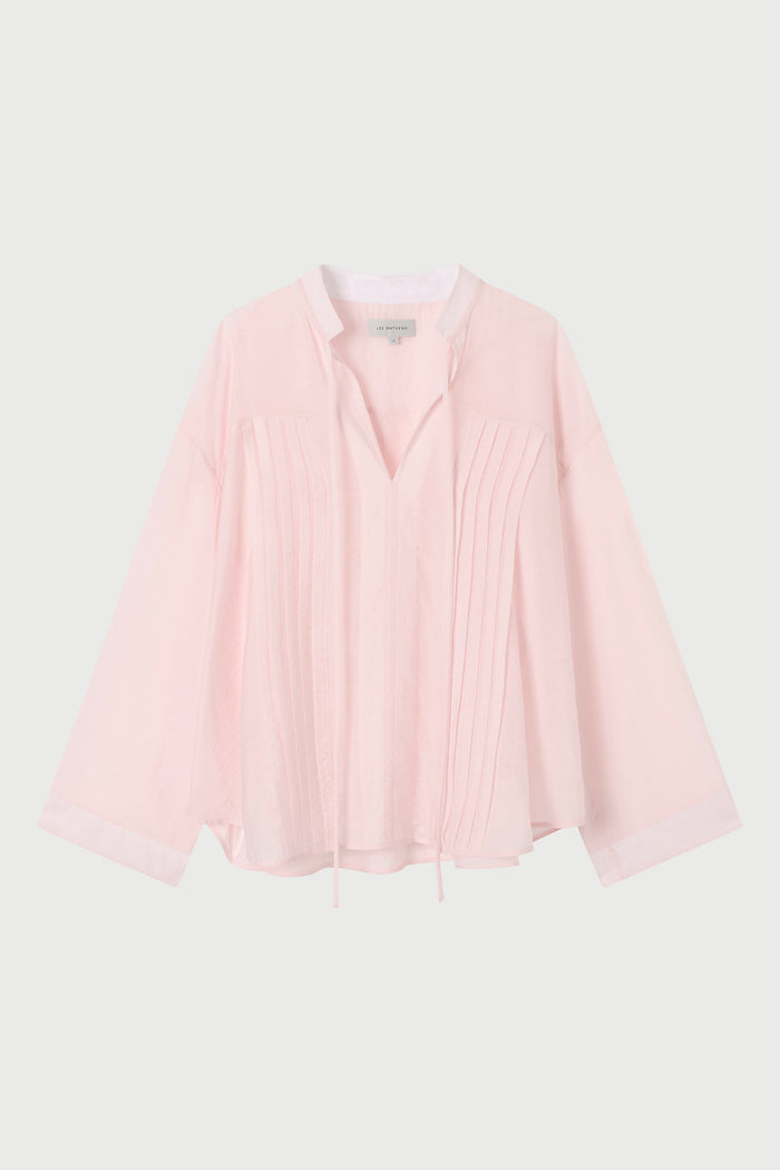 light pink shirt on a white background
