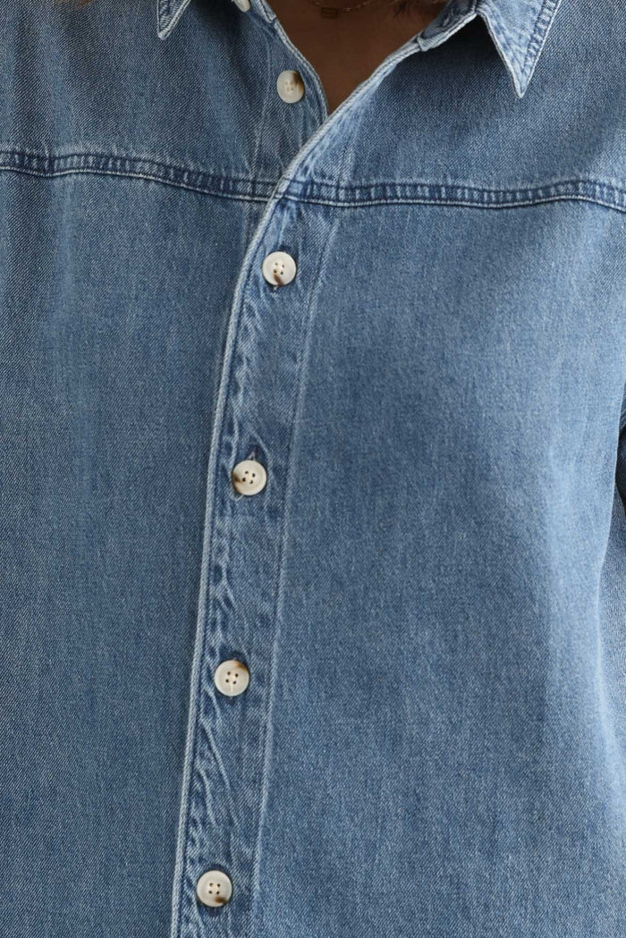 Quinn Blue Denim Collared Shirt,brunette model,Close up of outfit,alt text|model:Cara