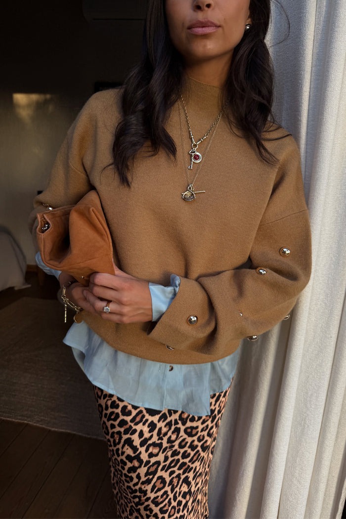 Tan Stud Evie Knit Jumper with gold stud details, styled with a leopard Jaspre skirt.