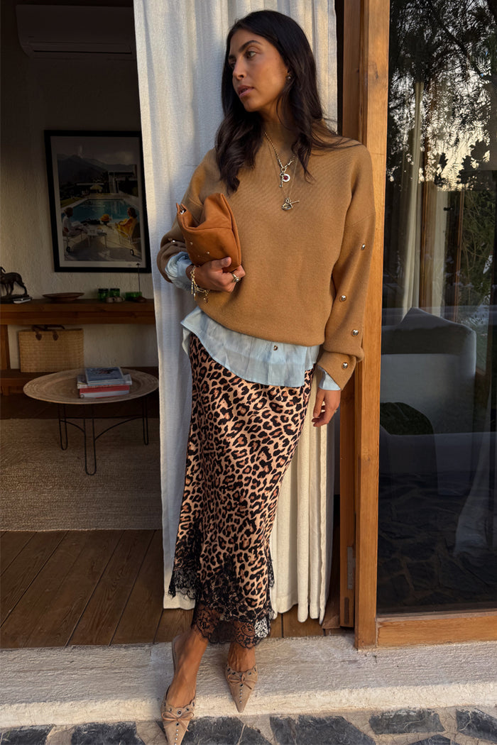 Tan Stud Evie Knit Jumper with gold stud detailing, styled with a blue shirt and leopard Jaspre skirt.