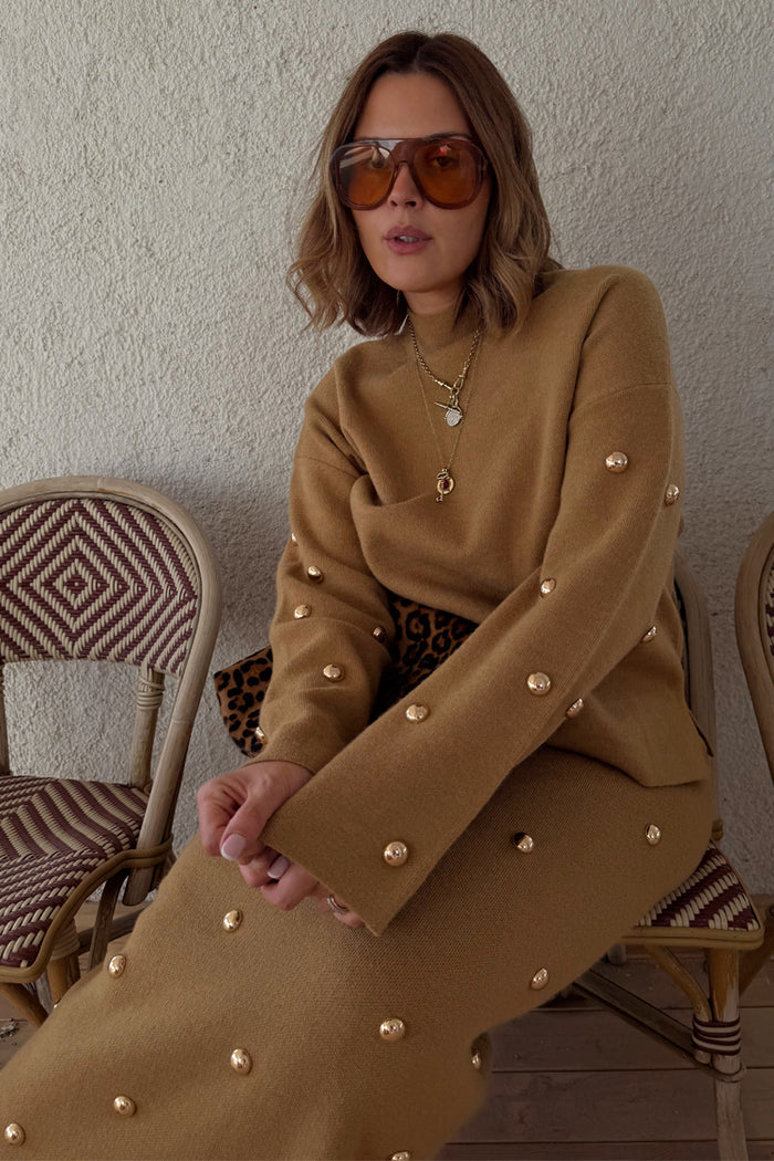 Tan Stud Evie Knit Jumper with gold stud detailing, styled as a co-ord with a matching skirt.
